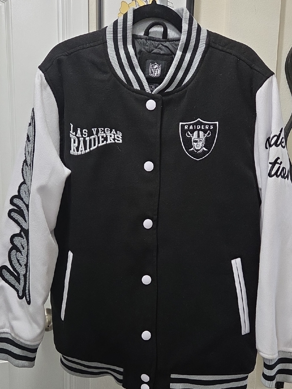 NFL Las Vegas Raiders Black and White Varsity Jacket